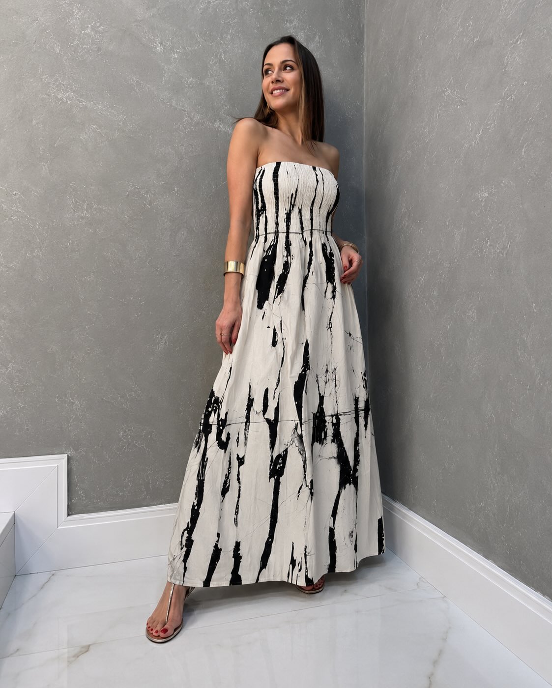 🔎 Marble Ink Batik Dress stylish strapless maxi dress with a bold black and ivory batik pattern inspired by flowing ink and marble designs. It has a fitted top that stays comfortably