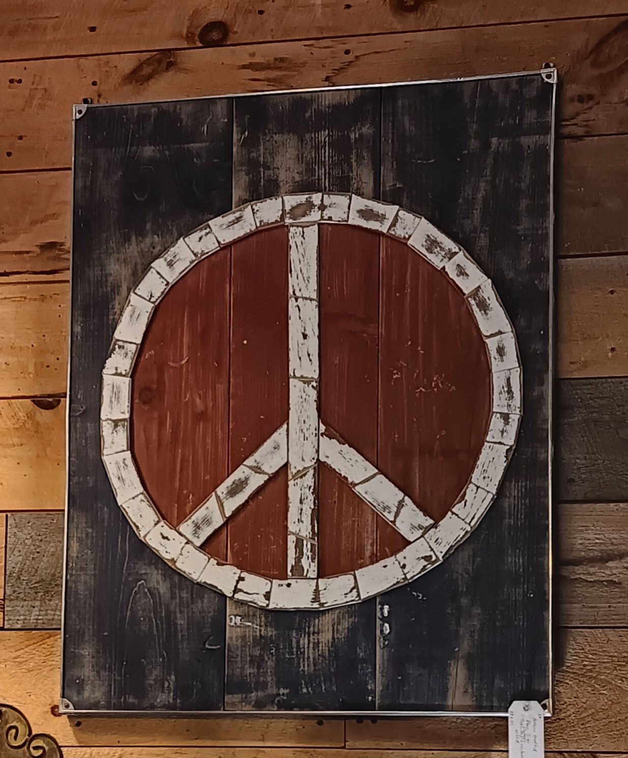 Vintage hand-carved wooden peace sign history