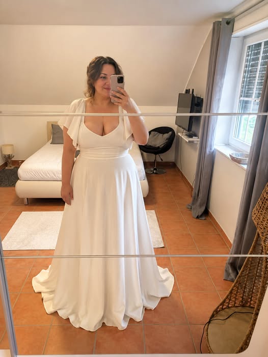 Adding side panels into a dress #bridalalterations #rimearodaky #themews