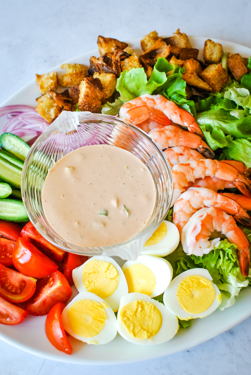 If Thousand Island and cocktail sauce had a sophisticated cousin... This would be it. Creamy, tangy, a little zippy, and absolutely perfect on shrimp salads all summer long. Recipe: https://sweetpealifestyle.com/shrimp-louie- salad-dressing 