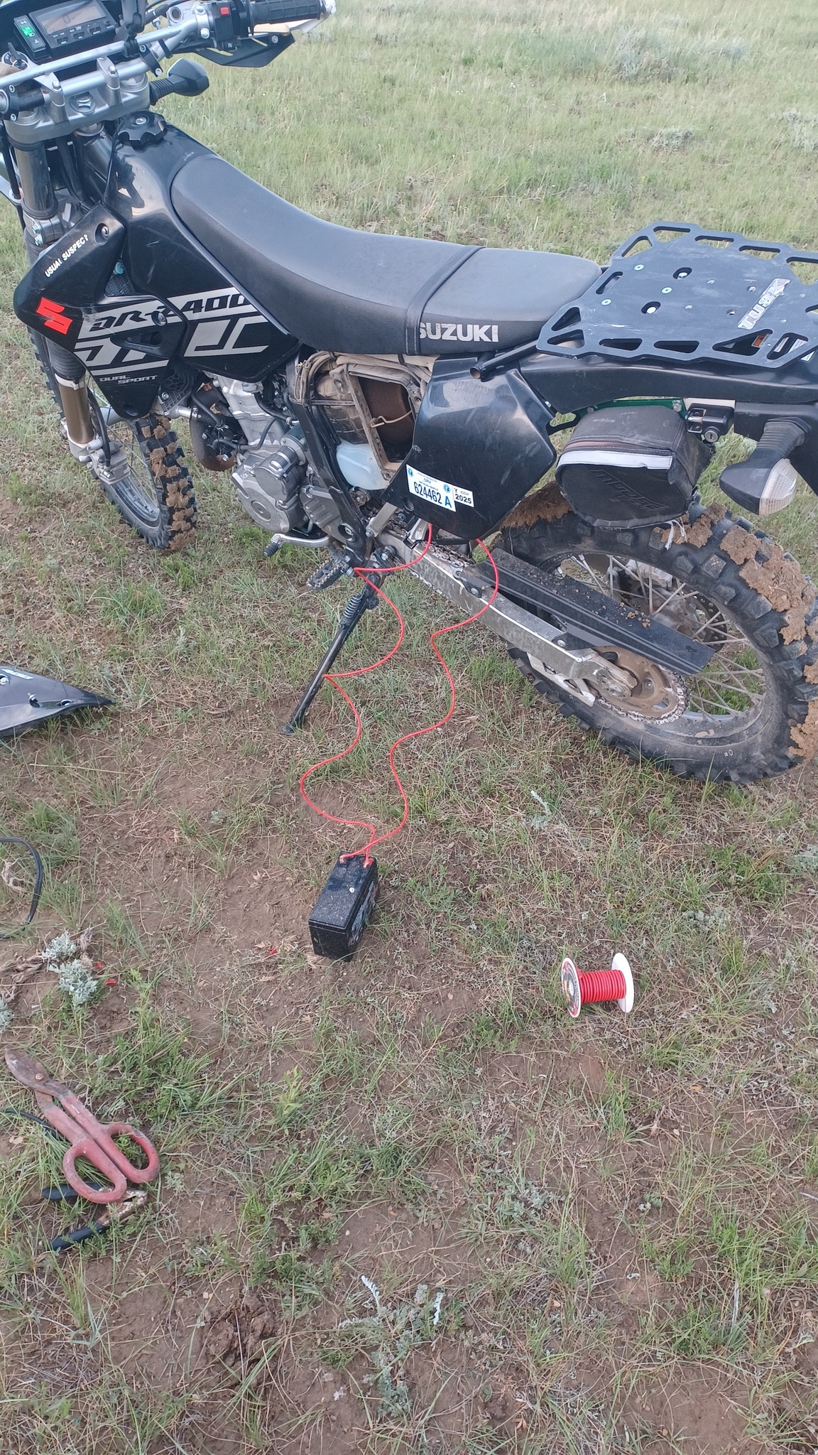 Jump starting a dead dual sport motorcycle battery with DIY setup