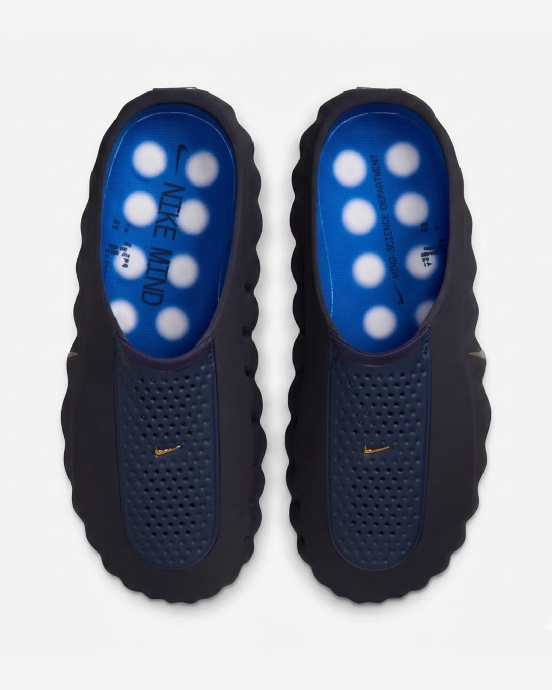 Here are official images of the “Blackened Blue” Nike Mind 001