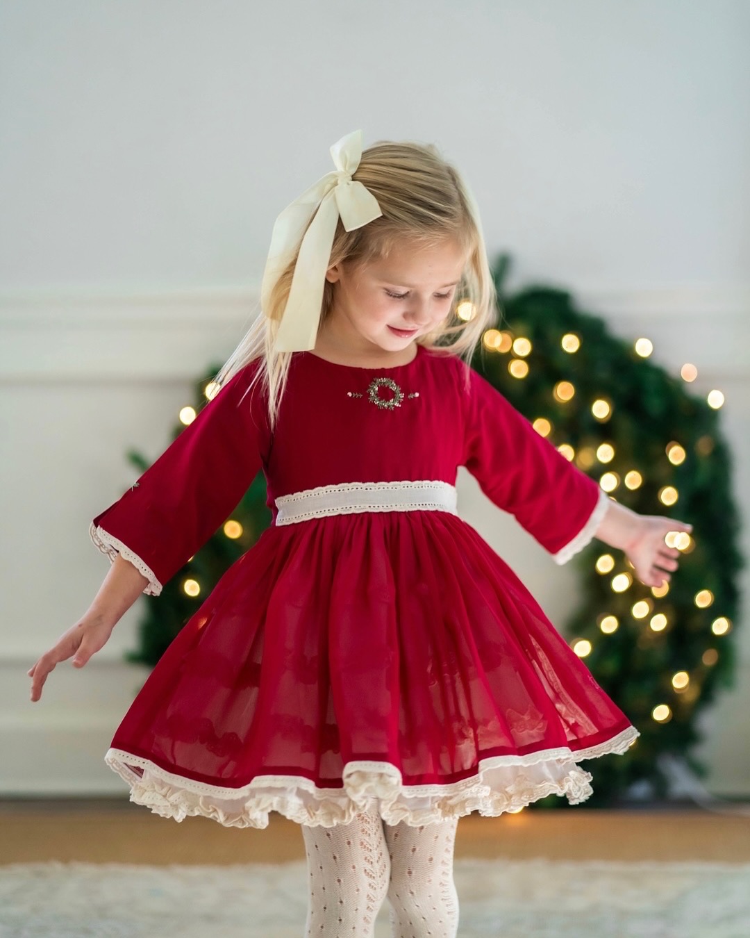 well dressed wolf christmas dress Meet our newest Meg: rich berry red with a semi-sheer skirt atop a full ivory skirt adorned with rows of ruffled eyelet. Delicate wreath embroidery provides a beautiful focal point on her color:Blue & White Kids clothing feature:GATHERING Steel Magnolia-Inspired Color Palette