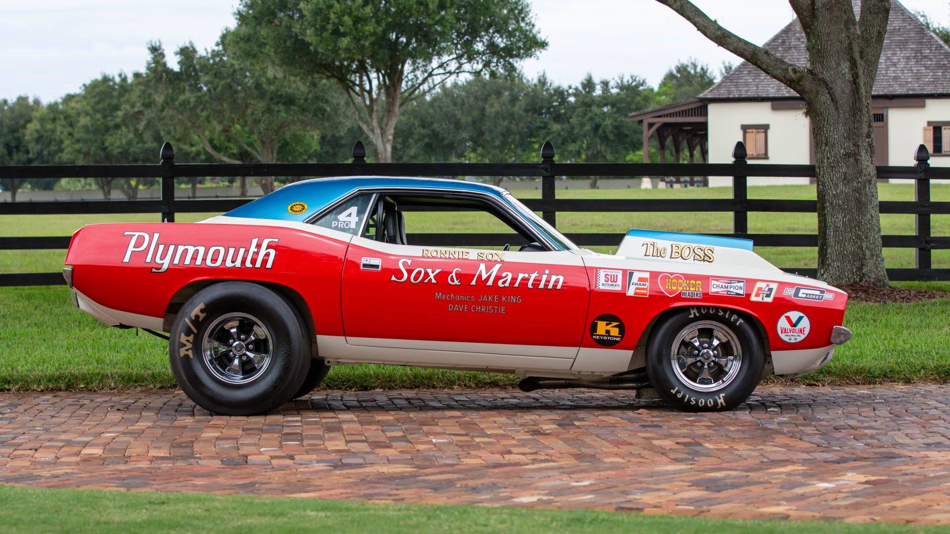 The 1970 Plymouth Hemi Cuda Sox & Martin Drag Car sells for a 