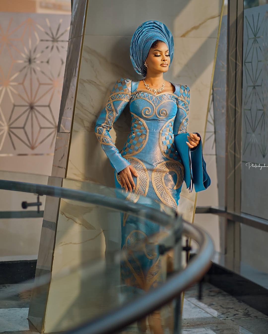 Yoruba bride dazzling in an electric blue Engagement dress. When it comes to finishing and elegant look ,you can always count on us to create a WOOW look for you in your