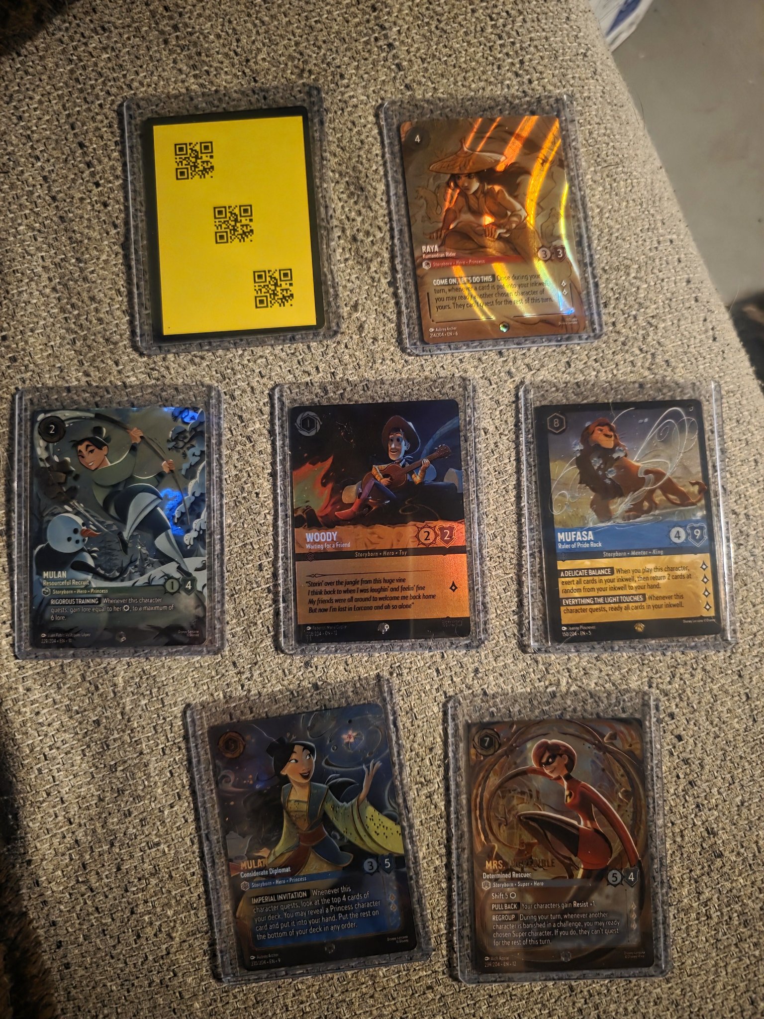 lorcana card back image Disney You Came Enchanted Tiana – Celebrating Princess and Aladdin – Heroic Outlaw grace the card sleeves as well as one depicting the card back design. Getting this PSA return back