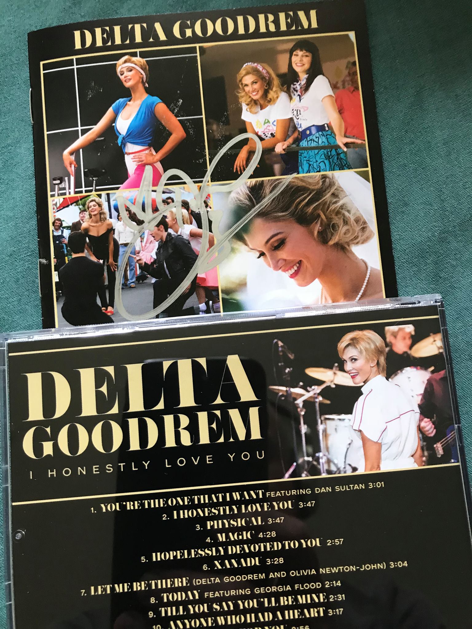 Olivia Newton-John signs fan's physical album