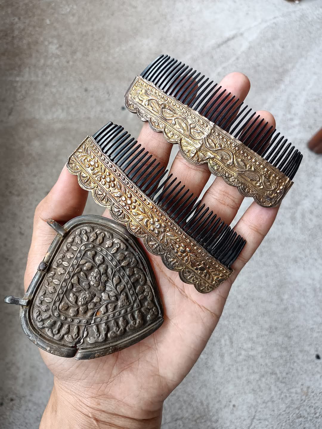 Two silver combs from local indigenous of Borneo