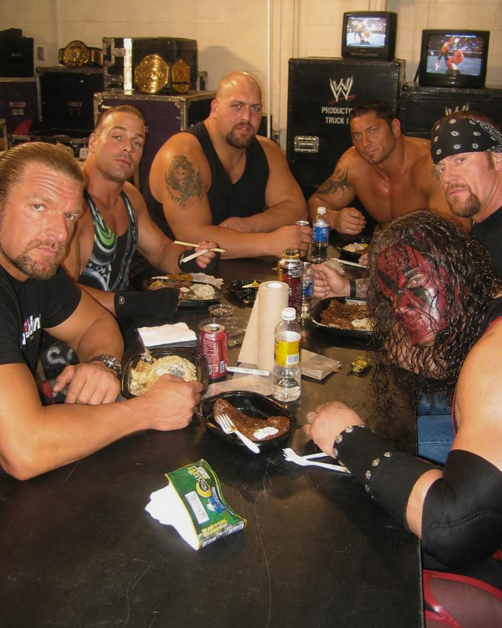 A legendary moment frozen in time as Triple H, Rob Van Dam, Big