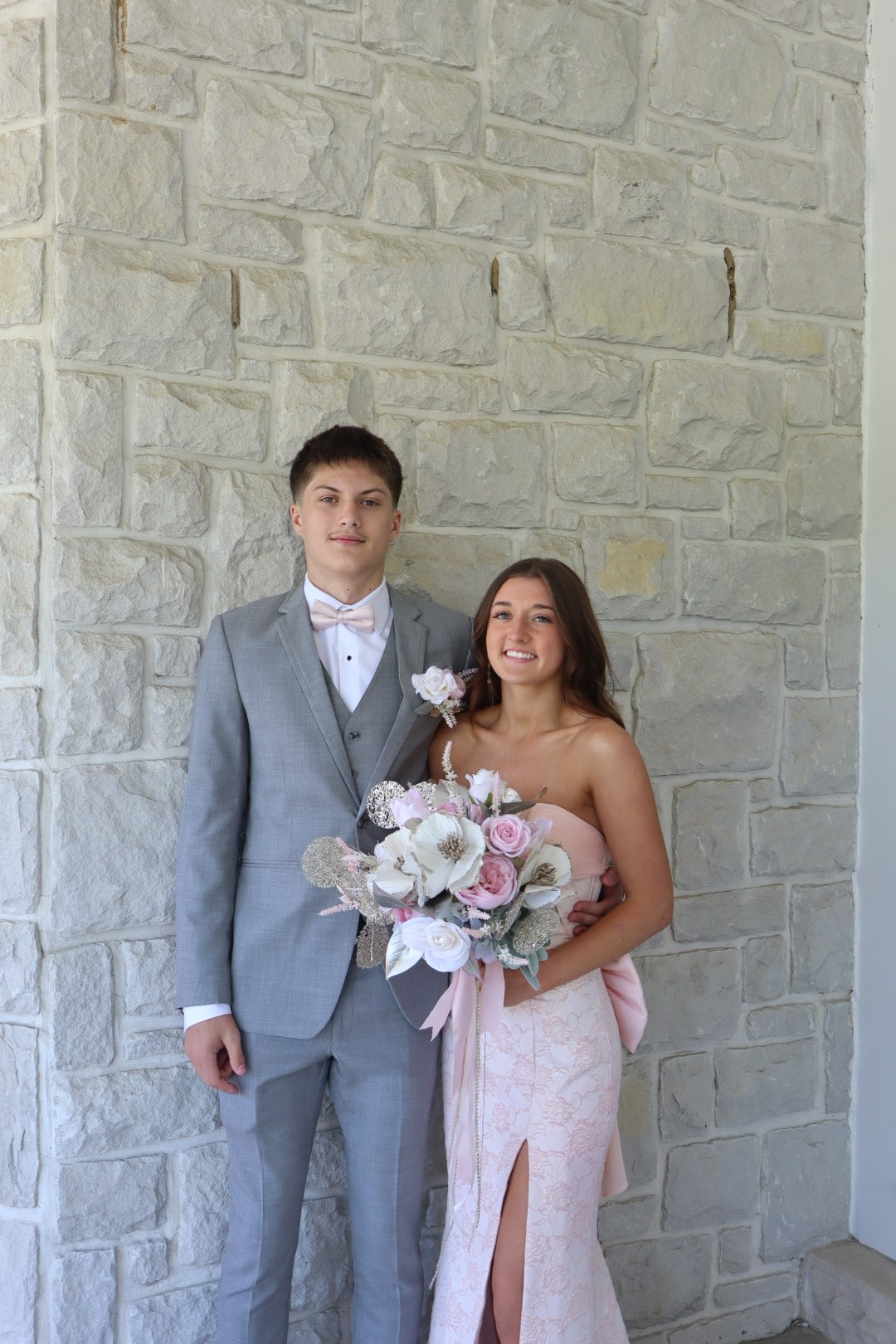 grey suit pink dress The heather paired with the blush bow tie gives Ean a crisp, modern prom style dark grey and pink suit