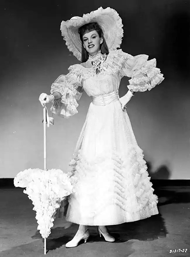On This Day In Herstory. On November 29, 1943 Judy Garland posed for these costume test photos for MEET ME IN ST LOUIS, featuring the blue tasseled dress that Esther wore to