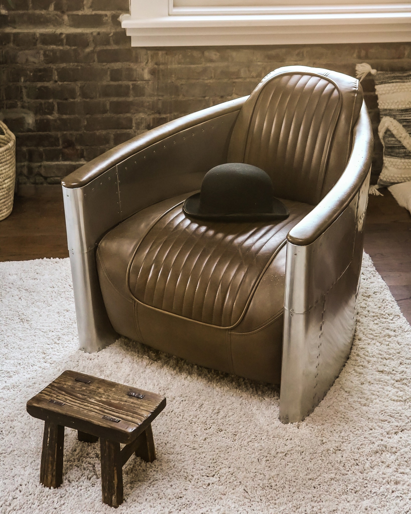 A Timothy Oulton original. The Aviator Tomcat chair in Spitfire