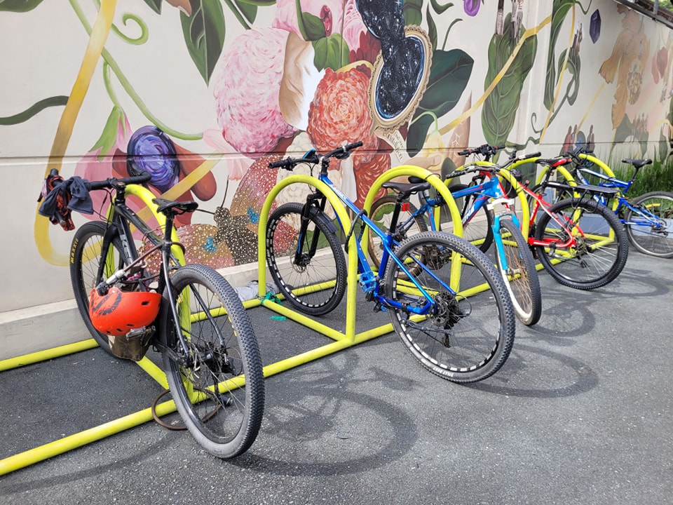 Travel - There's a bike rack near the Urban Farm and a Moovr Station so ...