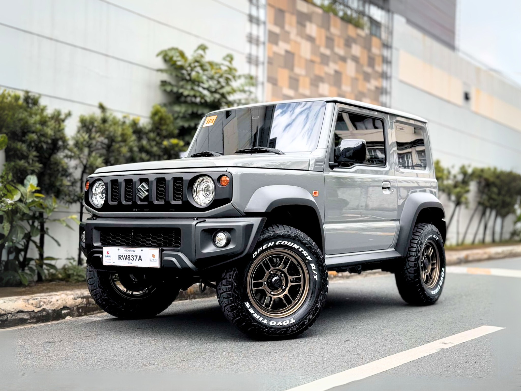 Another Jimny ready for anything! Upgrades include Enkei RPT1 