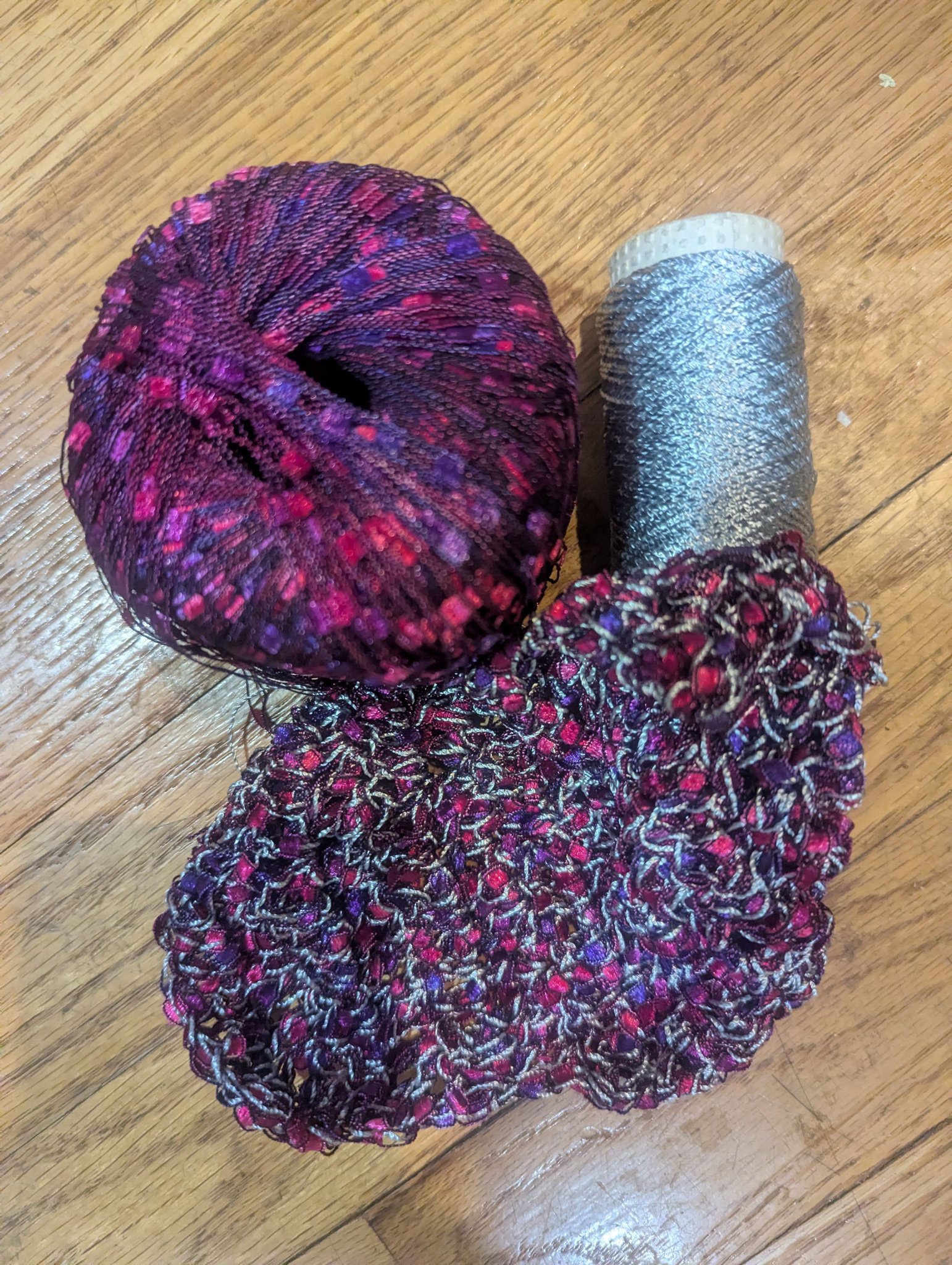 Ribbon section of Michaels. It's actually machine knit but looks