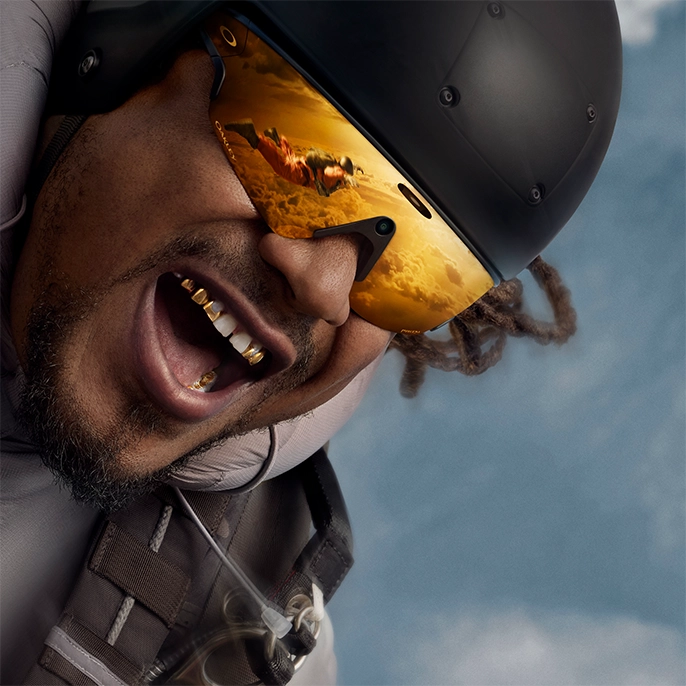 Marshawn Lynch wearing Oakley Meta Performance AI glasses while skydiving